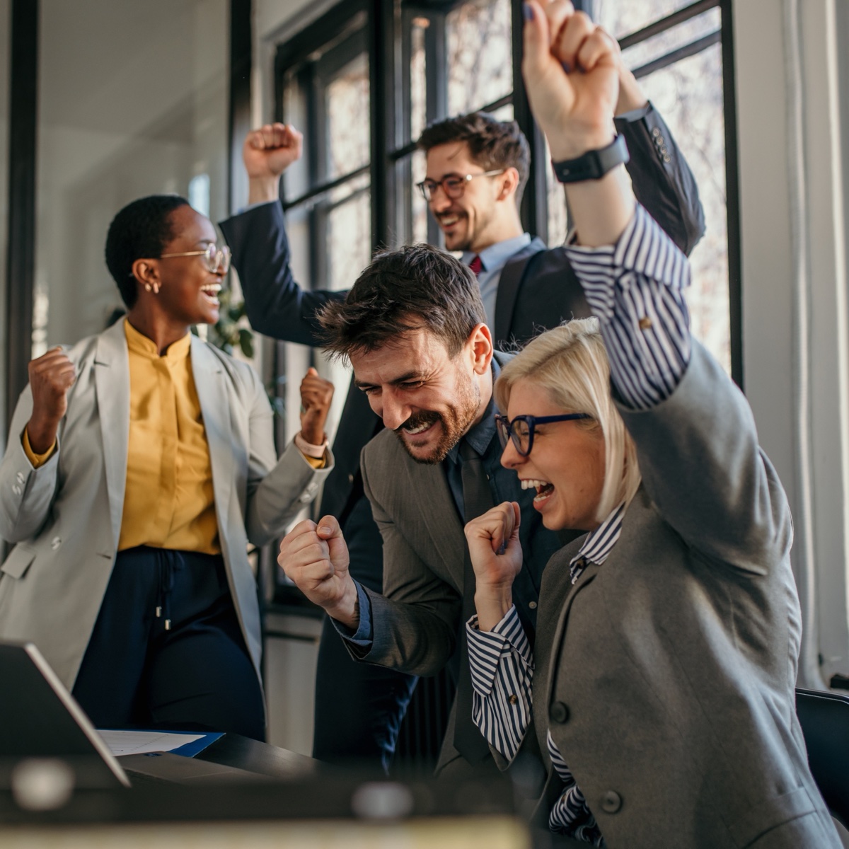 Team celebrating successful project delivery